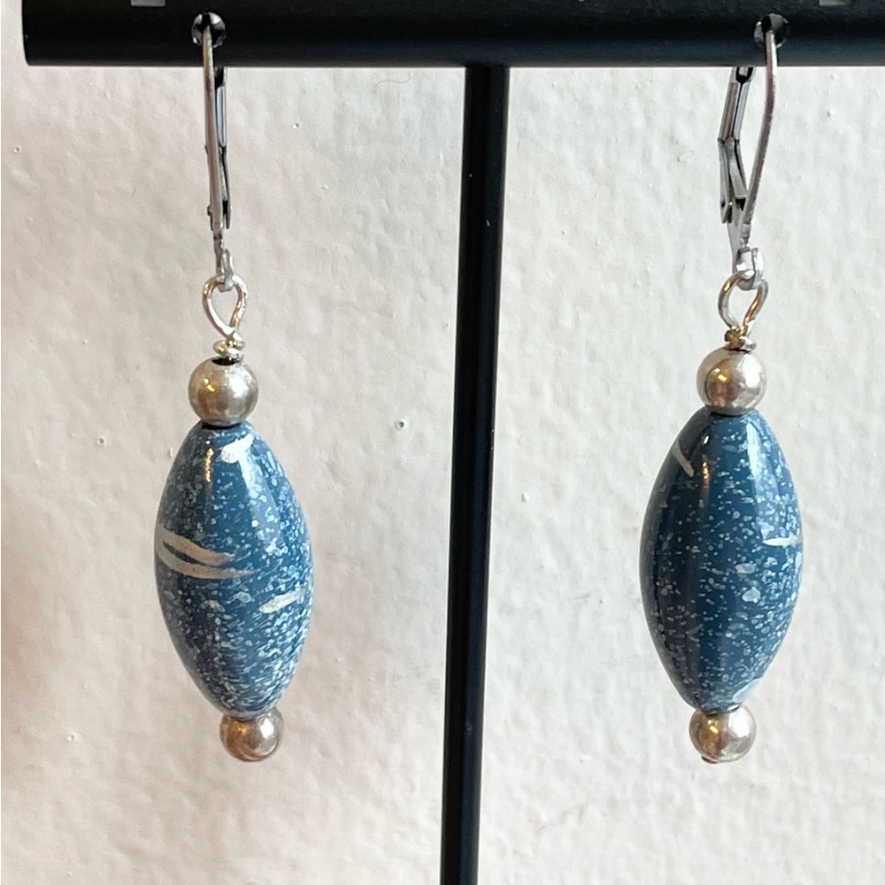 Hand-crafted, blue bead and silver colored dangle earrings